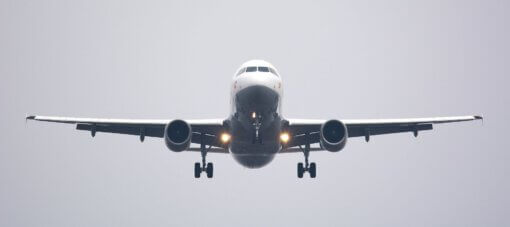 time lapse photography of white commercial airplane