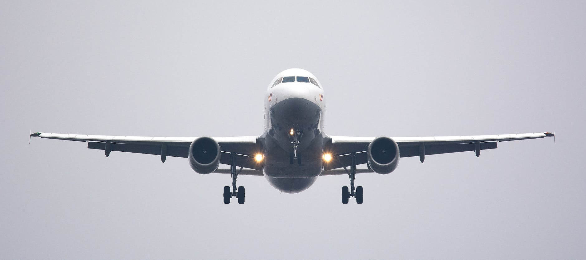 time lapse photography of white commercial airplane